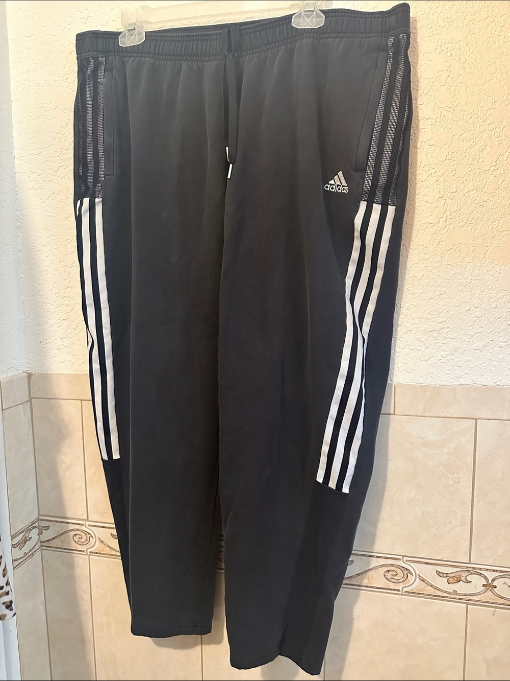 Adidas plus size Black Track Pants with White Stripe Detailing and zip up pocket